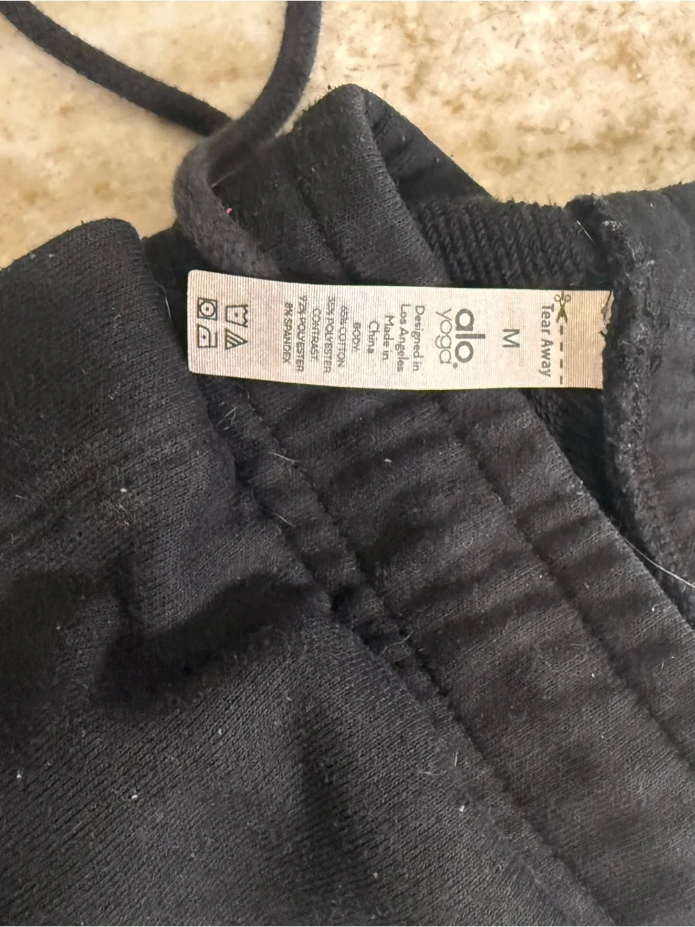 ALO Yoga Black Destroyed Joggers with Subtle Texture Size M